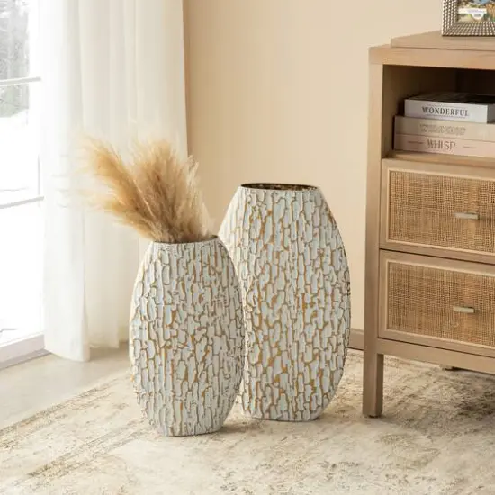 Glitzhome&reg; Gold & White Oval Textured Metal Floor Vases Set {3}