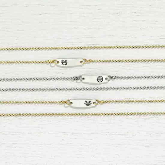 ImpressArt&reg; 4mm Zodiac Metal Stamps Pack {5}