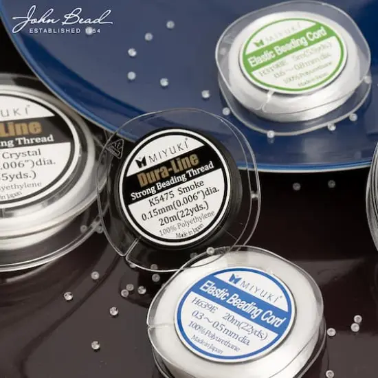 Miyuki&reg; 0.7mm White Elastic Beading Cord, 5.5yd. {5}