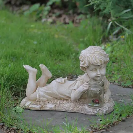 14.5" LED Lit Solar Powered Lounging Boy Outdoor Garden Statue {3}