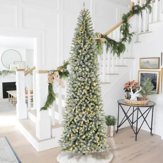 11ft. Pre-Lit Flocked Fir Pencil Artificial Christmas Tree, Warm White LED Lights {3}