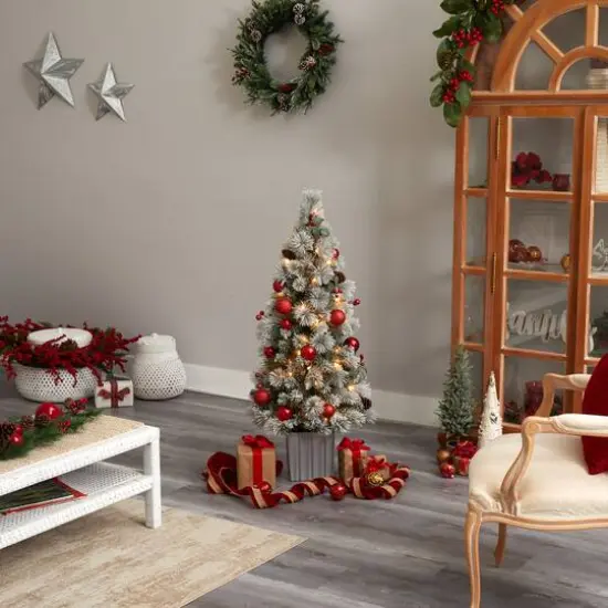 4ft. Pre-Lit Winter Flocked Artificial Christmas Tree in Decorative Planter, White LED Lights {10}