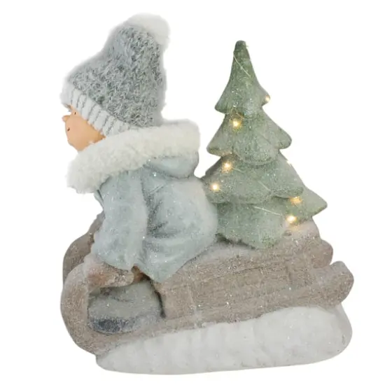 15" Beige & Green Lighted Boy on a Sled Christmas Decoration {5}
