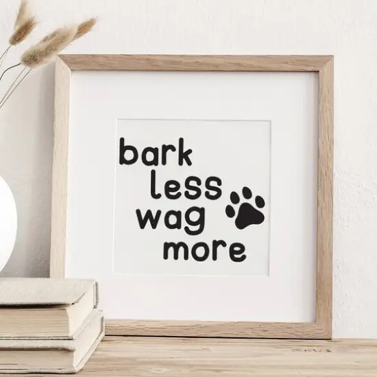 Leisure Arts&reg; Vinyl Bark Less, Wag More Black Wall Decal {3}