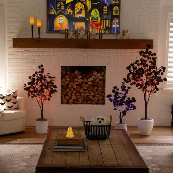 4ft. Pre-Lit Artificial Halloween Black Eucalyptus Tree with 160 Orange & Purple LED Lights {13}