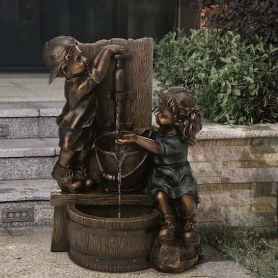 Glitzhome&reg; 25" Polyresin Boy and Girl Sculptural Outdoor Fountain {3}