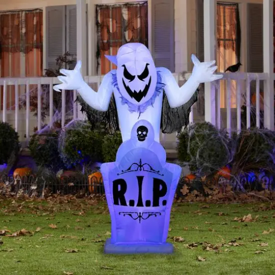 5ft. Airblown&reg; Halloween Inflatable Ghost & Tombstone with Flickering Black Lights {3}