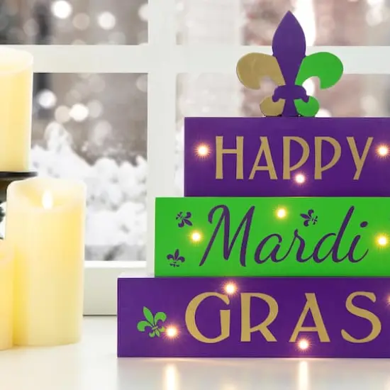 Glitzhome® 11.75" Lighted Mardi Gras Wooden Fleur-de-Lis Block Table Sign {6}