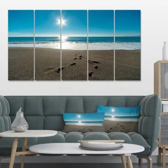 Designart - Blue Sea and Footprints in Sand - Large Seascape Art Canvas Print {3}