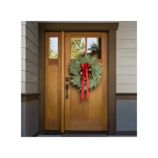 Hello Honey&reg; 24" Round Mixed Pine Wreath with Red Ribbon & Rust Finish Metal Bells {4}