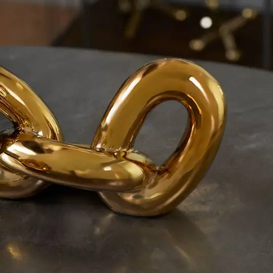 CosmoLiving by Cosmopolitan Gold Porcelain Glam Chain Sculpture Set {8}