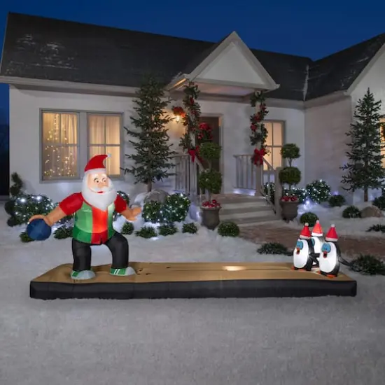 5ft. Airblown&reg; Inflatable Christmas Santa Bowling Scene {3}