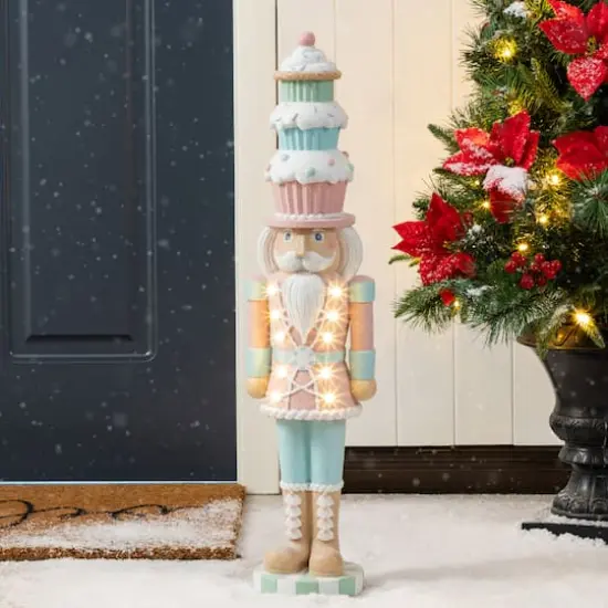 Glitzhome&reg; 28" Lighted Resin Christmas Cupcake Nutcracker Porch Decor with Timer {3}