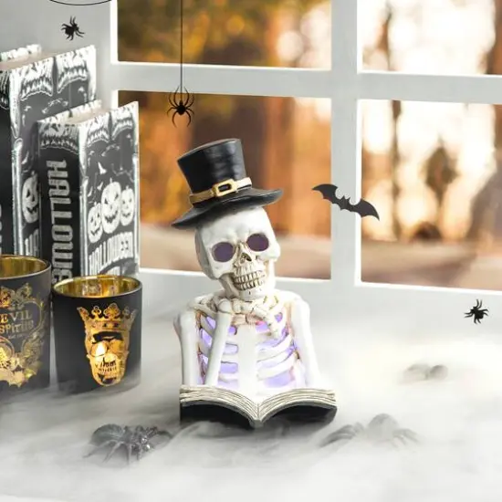 Glitzhome&reg; 10" Lighted Halloween Resin Skull Reading Book Table D&eacute;cor {3}