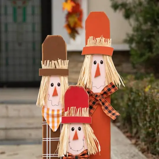 Glitzhome&reg; 36.25" Wooden Scarecrow Family Porch D&eacute;cor with Lighted Wreath & Timer {5}