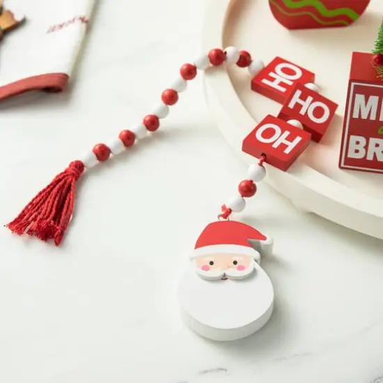 Glitzhome&reg; Christmas Wooden Word Signs & Fabric Santa Set {6}