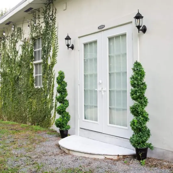 5ft. UV-Resistant Boxwood Spiral Topiary Artificial Tree in Decorative Planter {4}