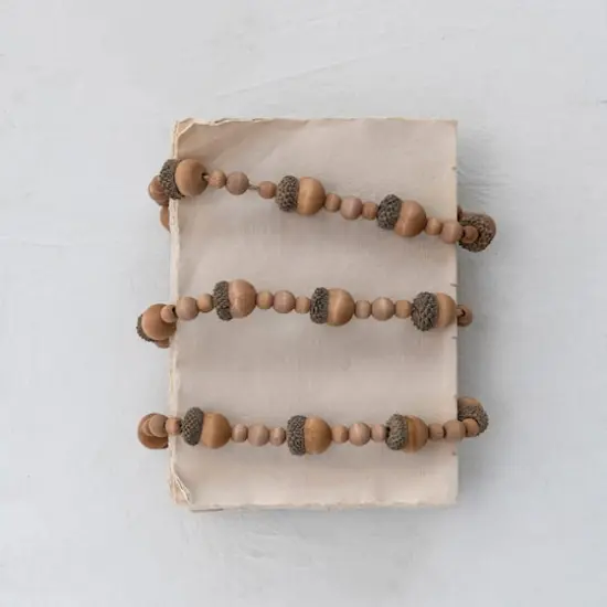 Hello Honey® 6ft. Brown Paulownia Wood Acorns & Beads Garland {4}