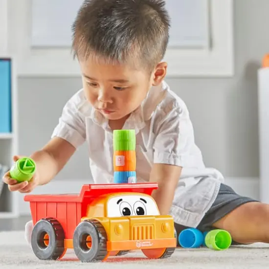Learning Resources Tony the Peg Stacker Dump Truck {4}