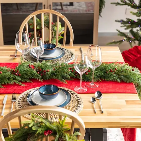 Glitzhome&reg; 9ft Christmas Greenery PE Cedar Garland with Red Berries {4}