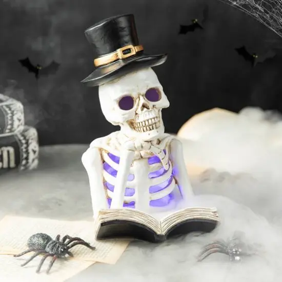 Glitzhome&reg; 10" Lighted Halloween Resin Skull Reading Book Table D&eacute;cor {5}