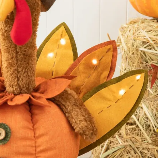 Glitzhome&reg; Lighted Fabric Turkey Standing D&eacute;cor with Telescoping Legs & Timer {12}