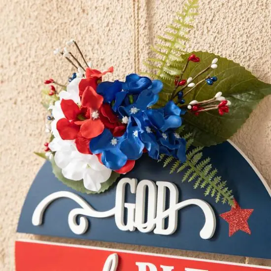 Glitzhome&reg; 14" God Bless America Round Sign {6}
