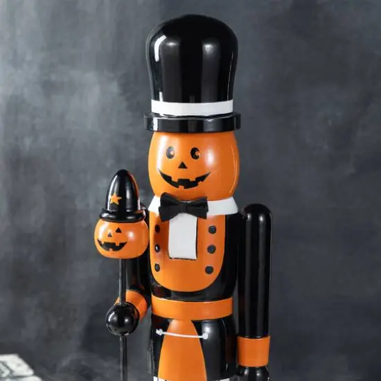 Glitzhome&reg; 18.5"H Halloween Wooden Pumpkin Nutcracker with Ghost Ornament {5}