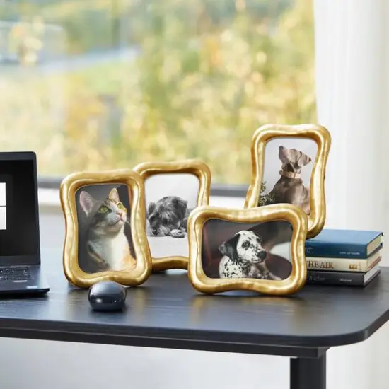 Glitzhome&reg; 4 Pack 4" x 6" Vintage Gold Resin Tabletop Picture Frames {6}