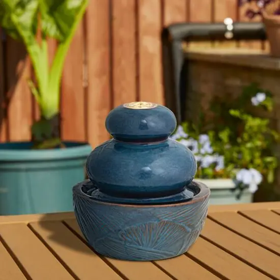 Glitzhome&reg; 8.75" LED Turquoise Leaf Textured Ceramic Tabletop Fountain {7}