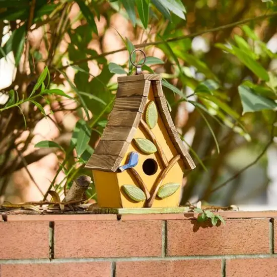 Glitzhome&reg; 9.5" Yellow Distressed Wood Birdhouse with Leaves {7}