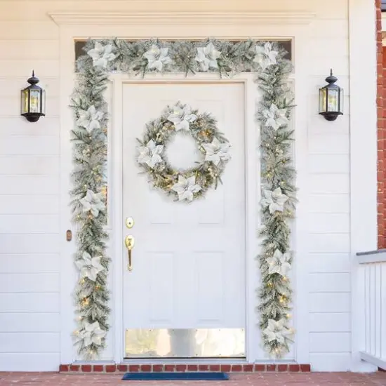 Glitzhome&reg; 9ft. Pre-Lit Snow-Flocked Greenery Pine & Poinsettia Christmas Garlands, 2ct. {3}