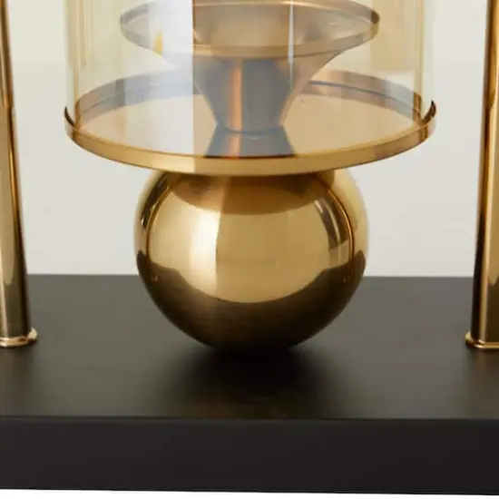 CosmoLiving by Cosmopolitan 17" Gold Metal Pillar Hurricane Lamp with Metal Stand {4}