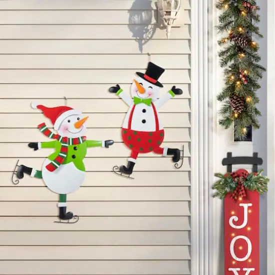 Glitzhome&reg; 36" Metal Christmas Skiing Snowmen Yard Stake Set {3}