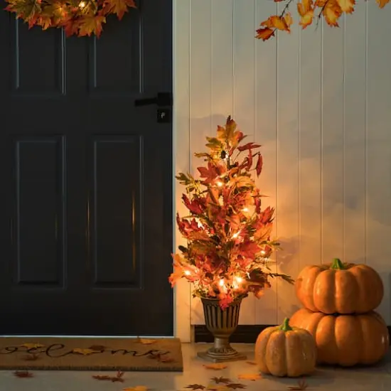 Glitzhome&reg; 3ft. Fall Lighted Maple Leaves Tree in Urn with Timer {12}