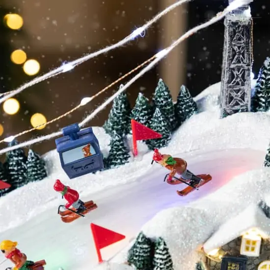 Glitzhome&reg; 16" Christmas Oversized Resin Lighted Musical Skiing Table Village Decor {5}