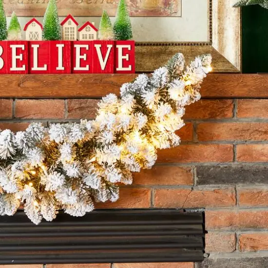 Glitzhome&reg; 36" Pre-Lit Snow Flocked Christmas Swag with LED Lights {6}