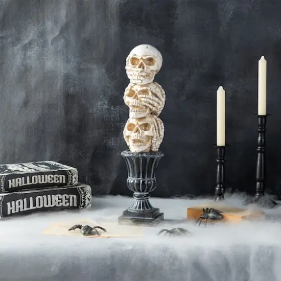 Glitzhome&reg; 18"H Halloween Resin Stacked Skull Table Decor {4}