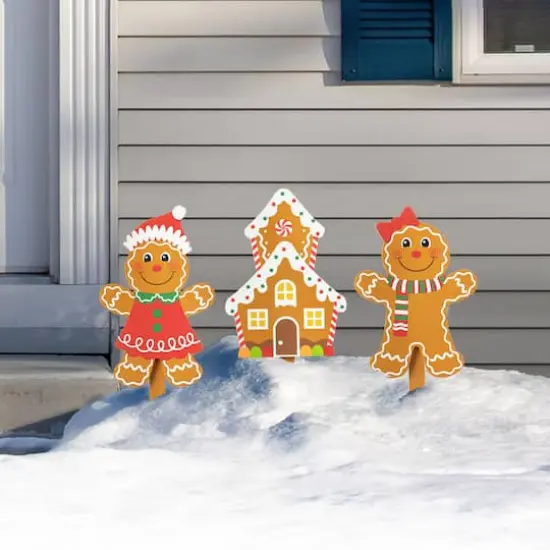 Glitzhome&reg; Wooden Gingerbread Man Yard Stake Set {3}