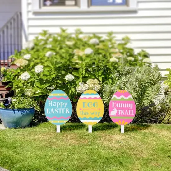 Glitzhome&reg; 15" Wooden Easter Egg Yard Stake Set {4}