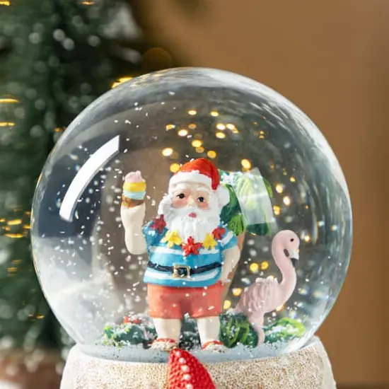 Glitzhome&reg; 100mm Christmas Resin Musical Snowflakes Santa on Vacation Waterglobe {6}