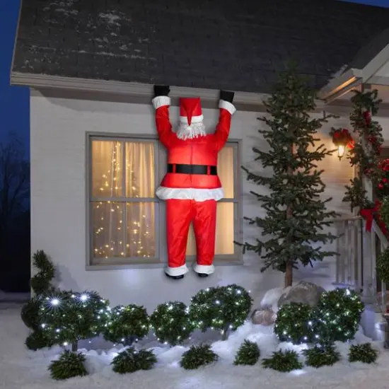 6.5ft. Airblown&reg; Inflatable Realistic Roof-Hangin' Santa {5}