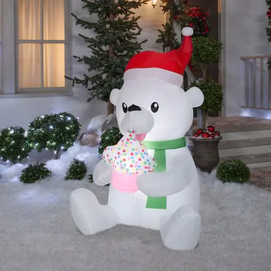 5.5ft. Animated Airblown® Inflatable Nom Nom Polar Bear with Cupcake {3}